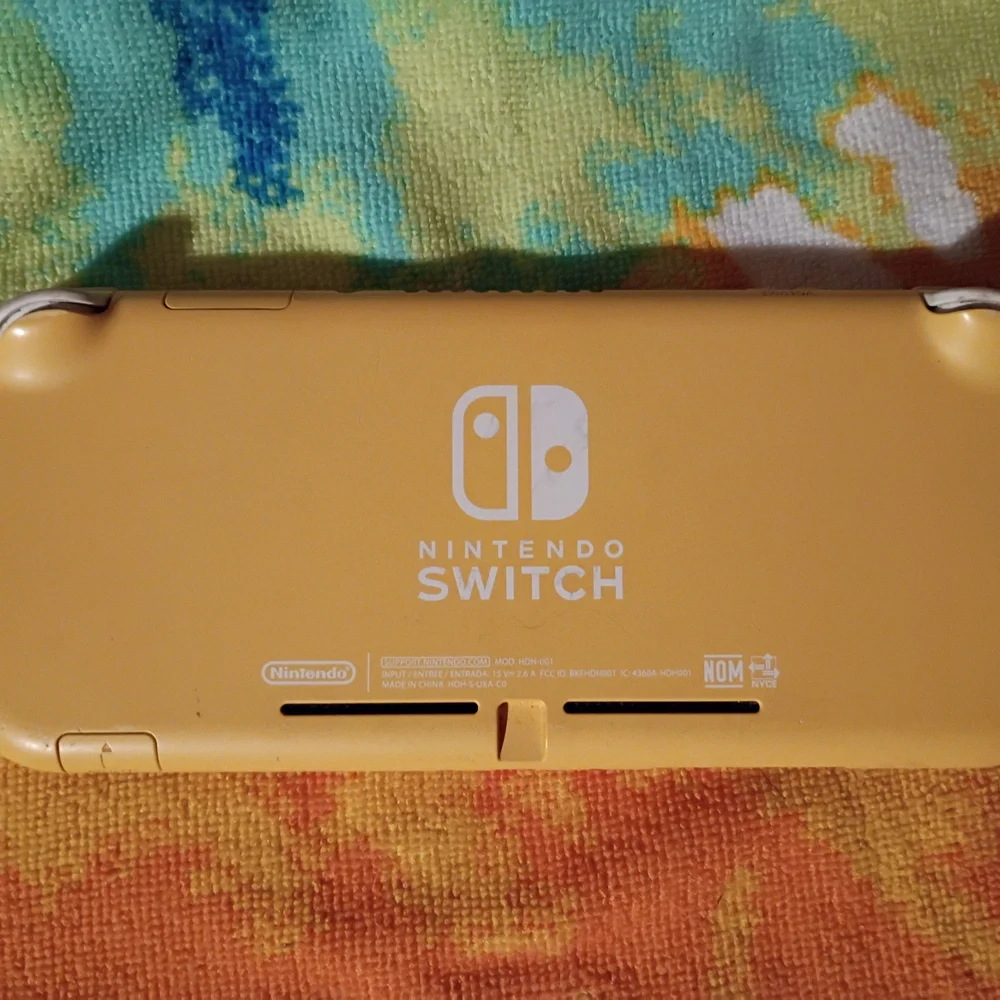 Portable Yellow Gaming Console